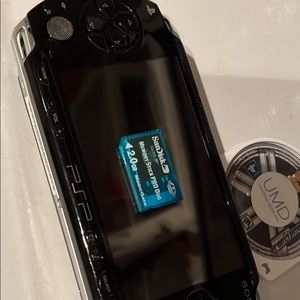 PSP gaming device with midnight club game, memory card and car charger